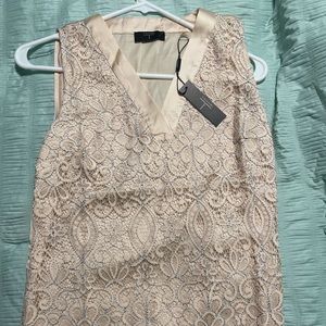 Cream Sleeveless Blouse. Brand new with tag.